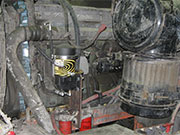 Spinner II centrifuge mounted in an engine compartment