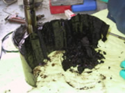 Collected sludge cake removed from a rotor