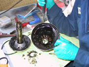 Technician servicing a centrifuge rotor